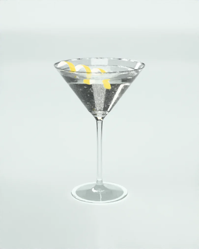 Limon kabuğuyla süslenmiş, berrak bir Dry Martini kadehi
