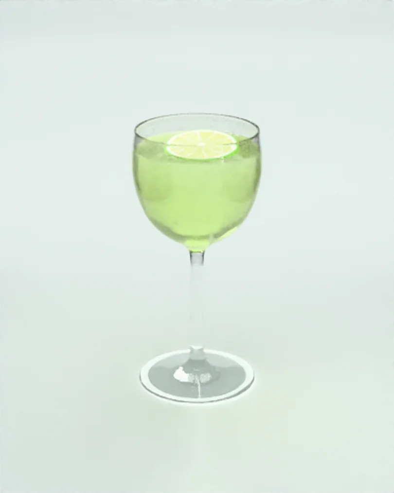 Yüzeyinde ince bir misket limonu dilimi yüzen soluk yeşil Gimlet